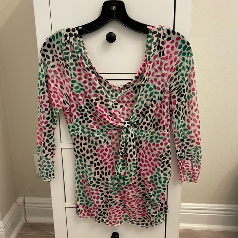 Diane von Furstenberg fitted, low cut silk top.